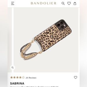 iPhone 14 Plus case. SABRINA
Vegan Leather Wristlet in Gold Leopard/Gold.